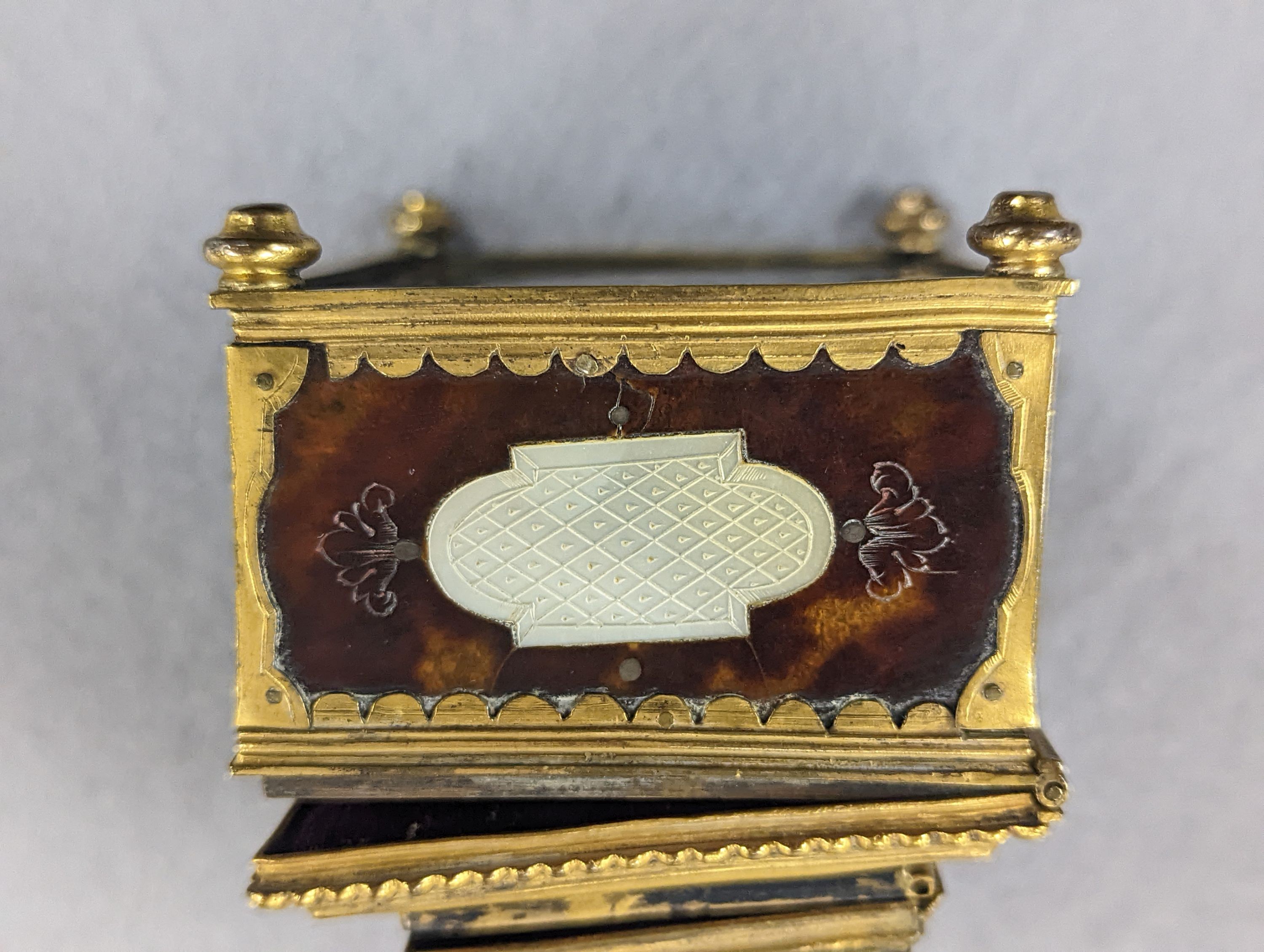 A 19th century gilt-brass and tortoiseshell casket 8cm